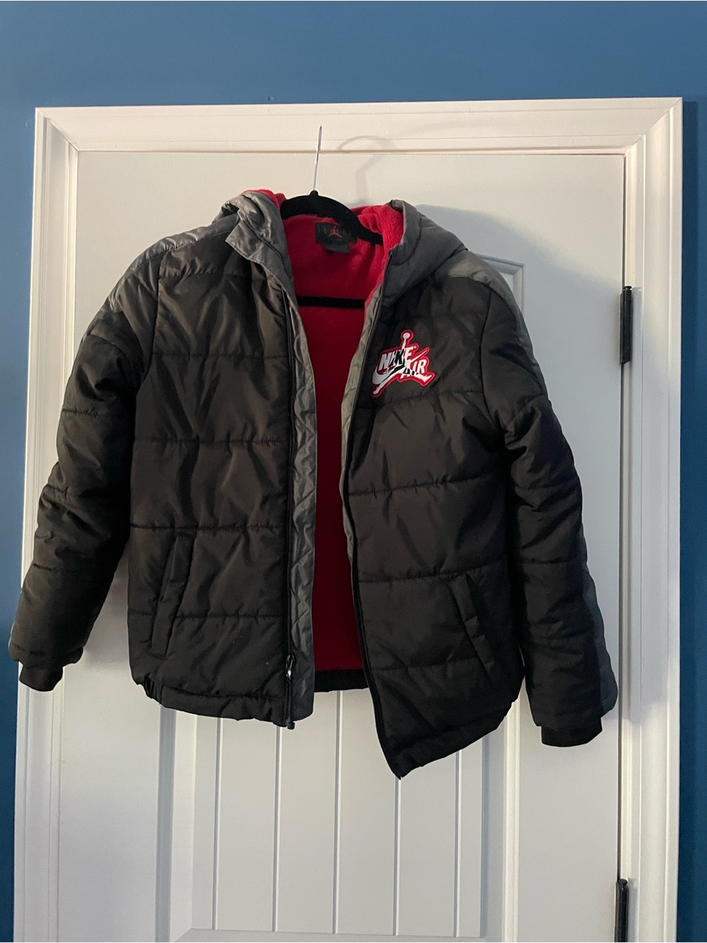 Nike Black Kids Puffer Jacket with Red Lining